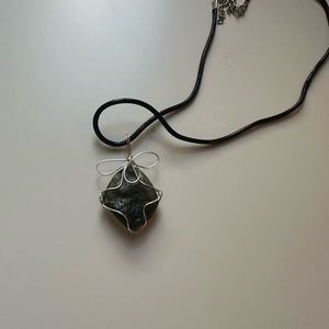 a dark green gem stone necklace